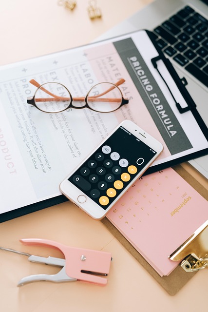 Paperwork on desk with calculator